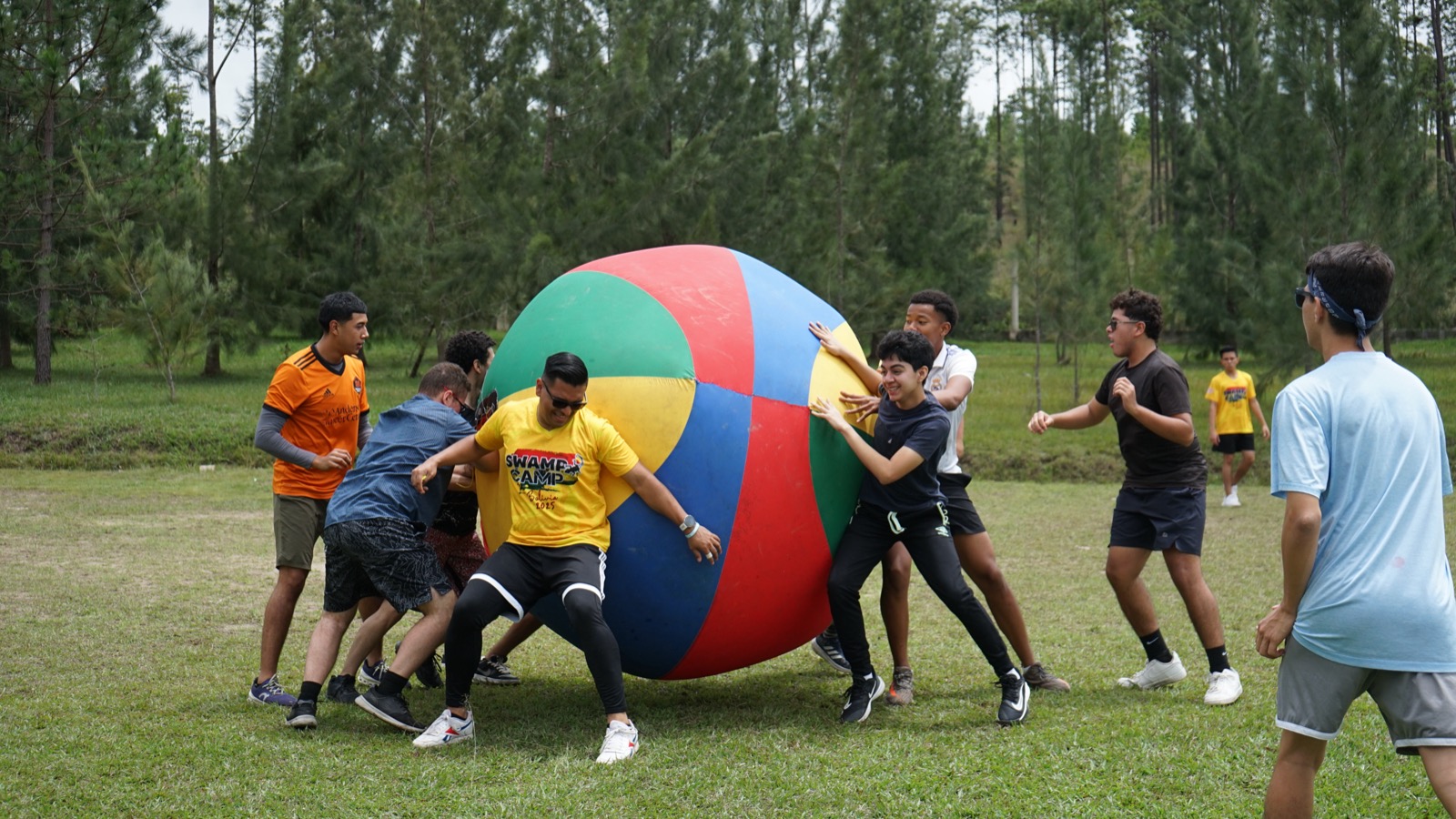 Camp team gathered outdoors